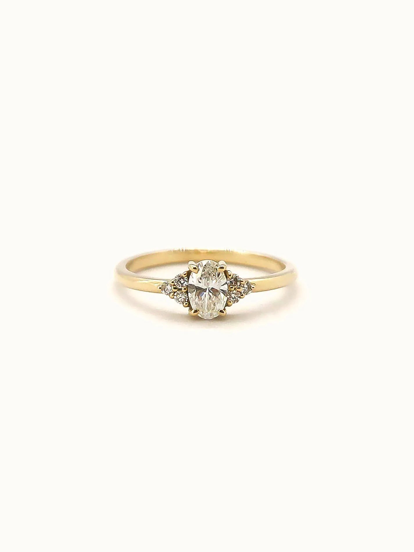 Camille. Oval diamond ring with diamond accents